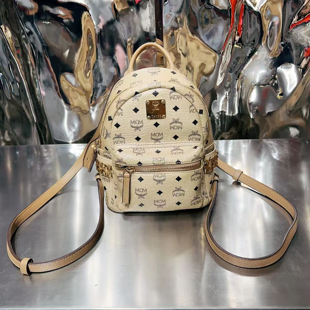 95新 MCM 淡黄色老花 双肩包/HD