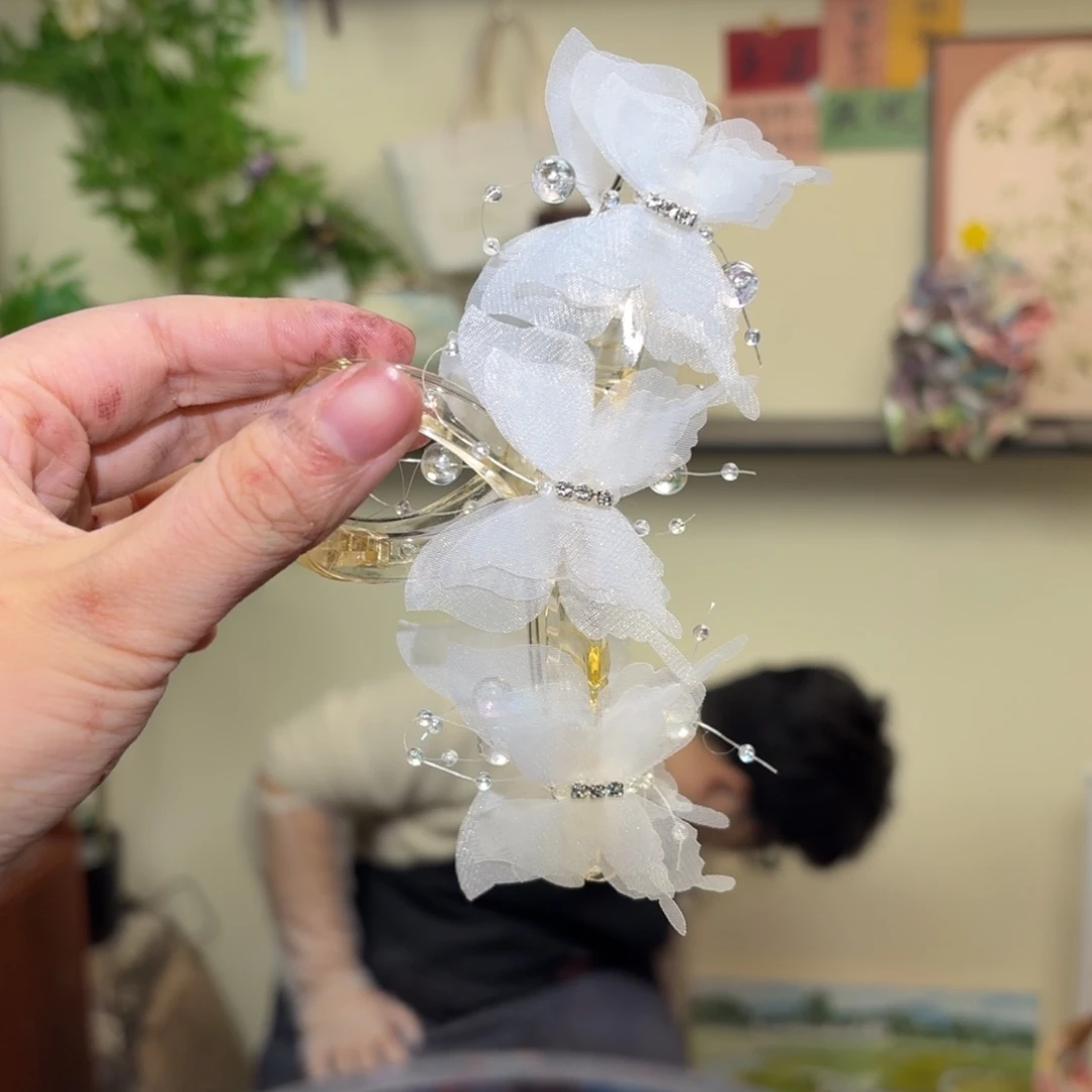 S***涵PU小蝴蝶结抓夹涵宝