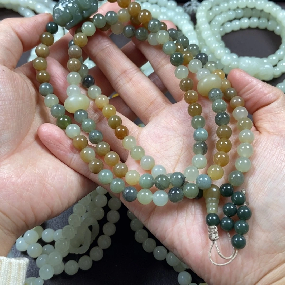 和田玉未镶嵌把件手持