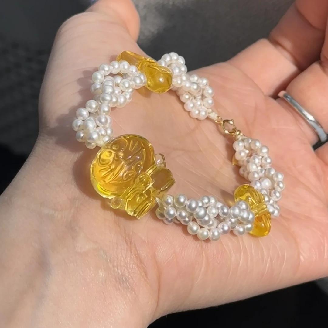 天然金珀机器猫百搭时尚轻奢珍珠扭扭链款可调节