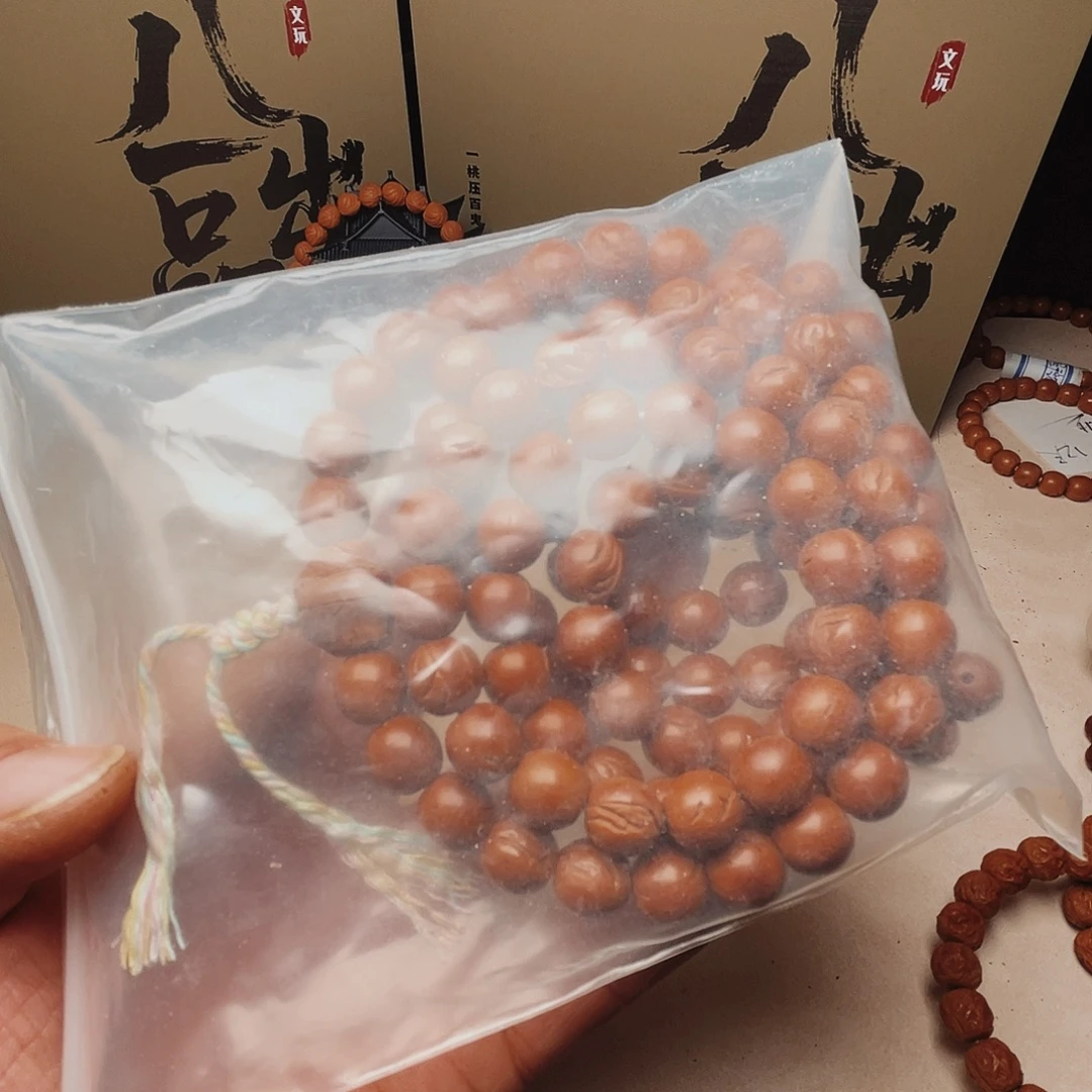 阿***。吊坠桃核桃核光柱