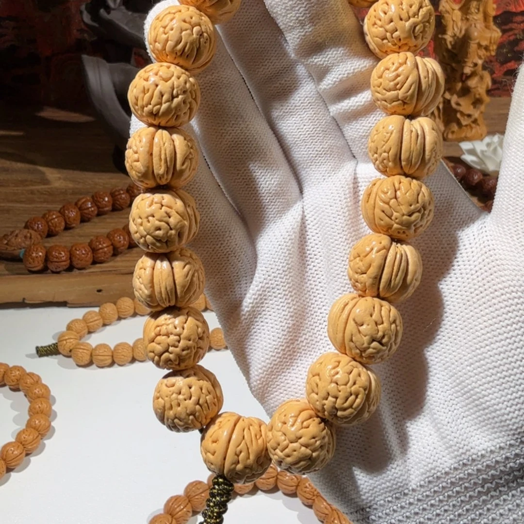 波***安吊坠桃核超头货滚像