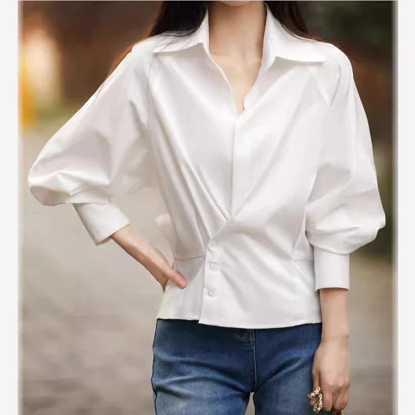 2024春秋季气质感斜扣佰搭收腰显瘦翻领小众时尚衬衫白色衬衣上衣
