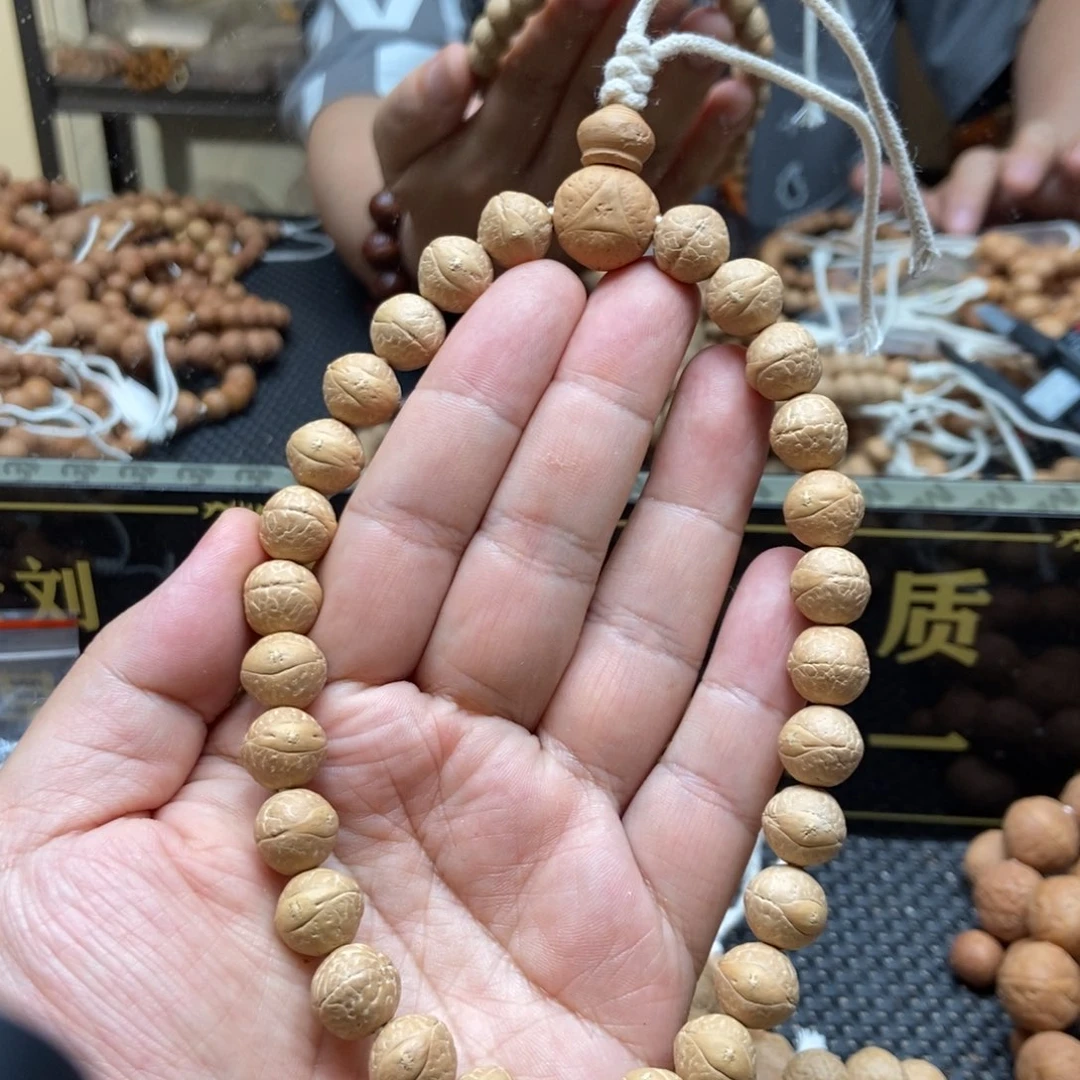 凤眼菩提吊坠12+精品手持