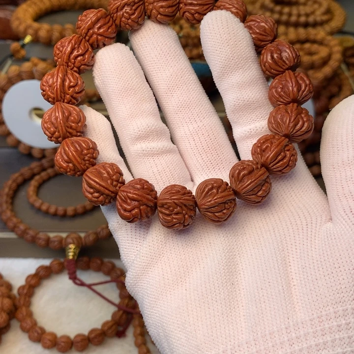 冷***。桃核手串秦岭龙纹