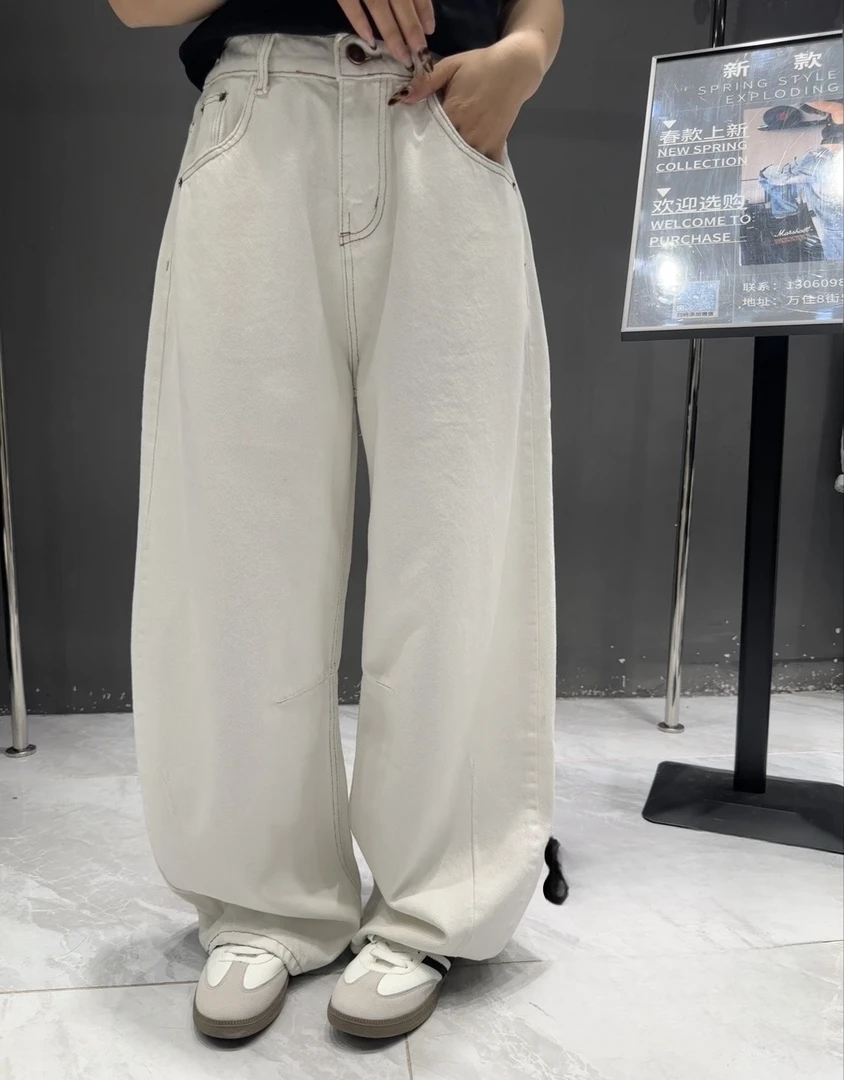 早春新款潮流气质时尚米色显瘦减龄休闲百搭弯刀牛仔裤8335-B