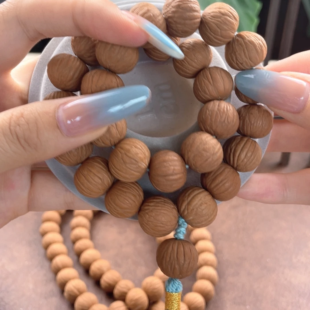 猴头核桃手串中国结流苏凤羽手持