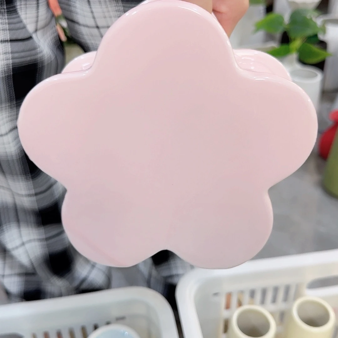 粉色陶瓷花瑕疵一个