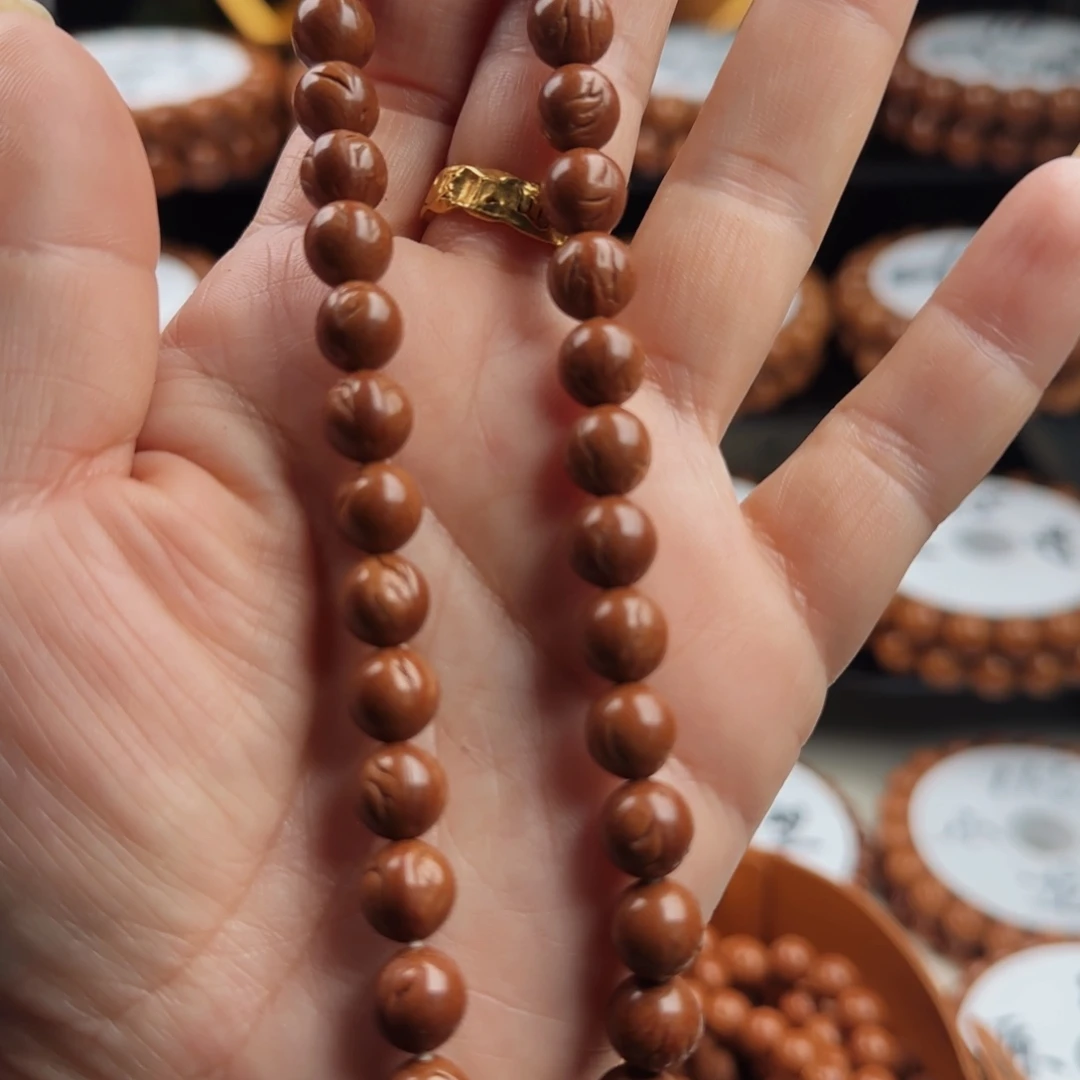 桃核吊坠正圆手持