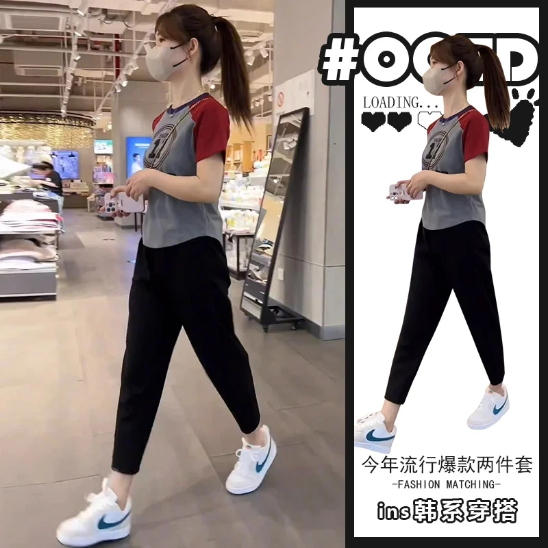 今年流行夏日网红洋气套装女装印花撞色T恤上衣+黑色九分裤两件套