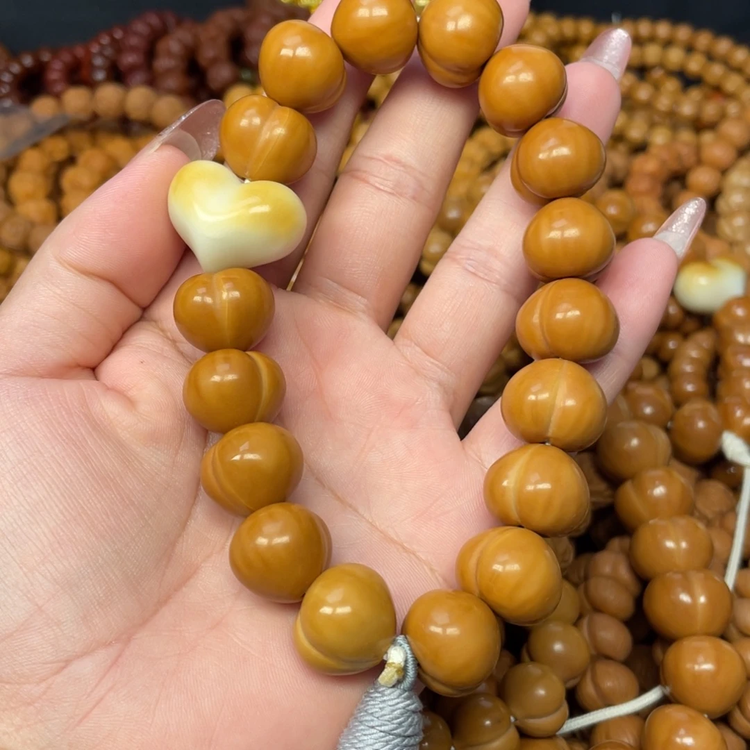 “***得手串猴头核桃微瑕屁桃手持17cm