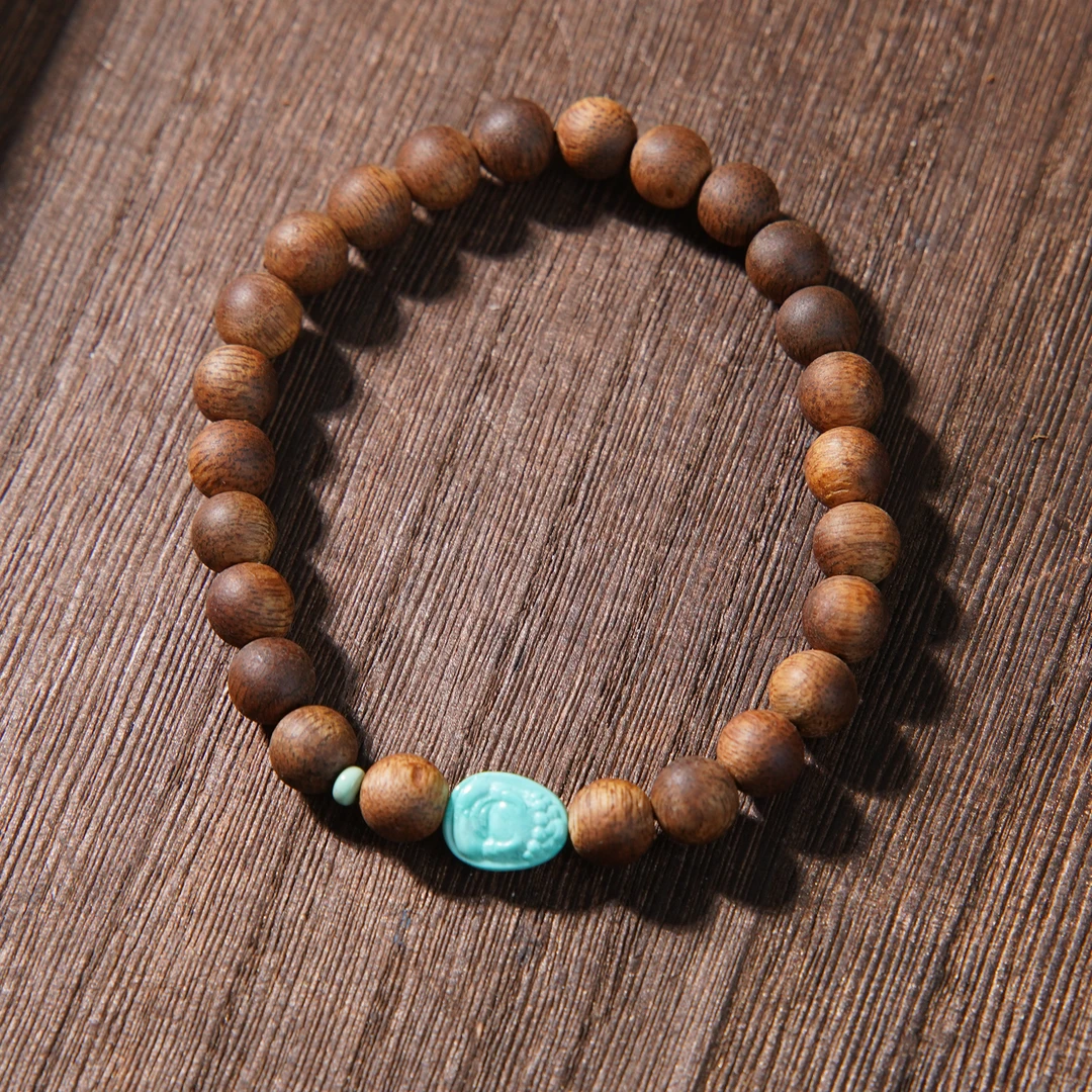 九九沉黄奇楠0.6DIY绿松（微瑕）单圈沉香手串/CX00409