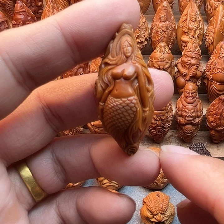 橄榄核吊坠19美女