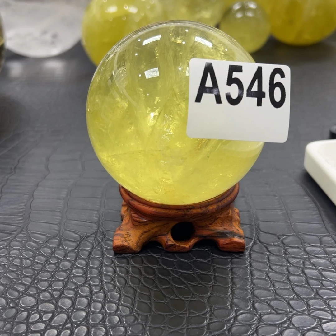 刘***记石材天然黄水晶球8.15
