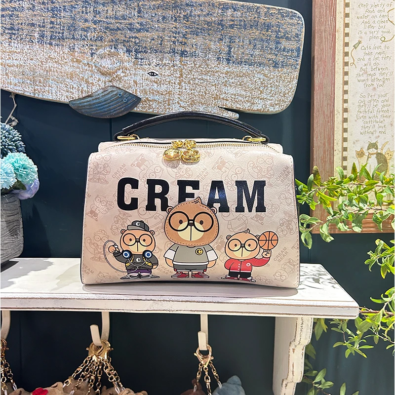 奶油熊官方正品2025新款手提包包大容量波士顿枕头包休闲时尚卡通