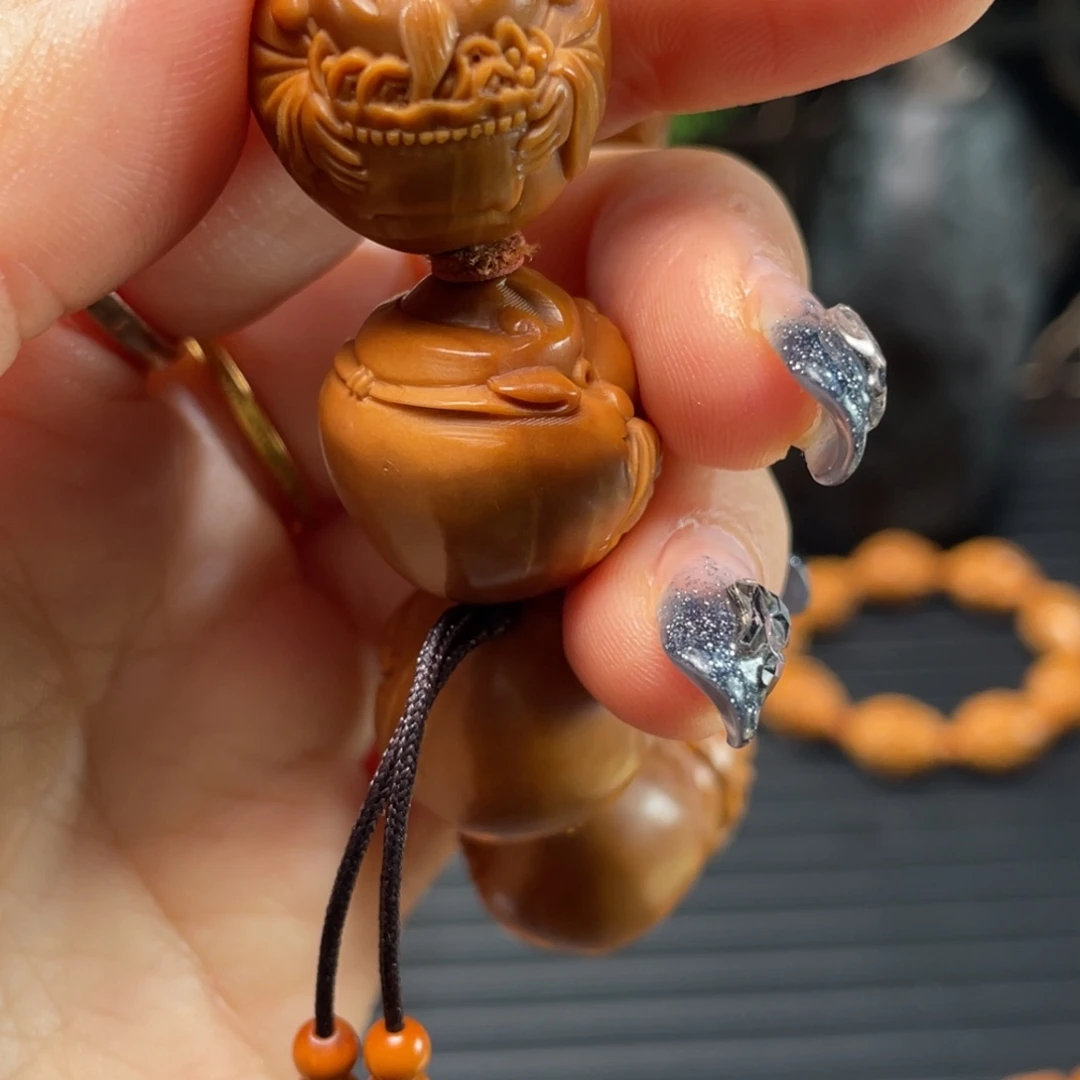 乐***呵橄榄核手串/手链6439苏工财神