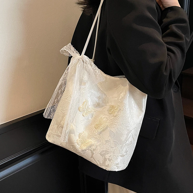 新中式刺绣包包女式2025新款夏季通勤百搭单肩包休闲托特包汉服包