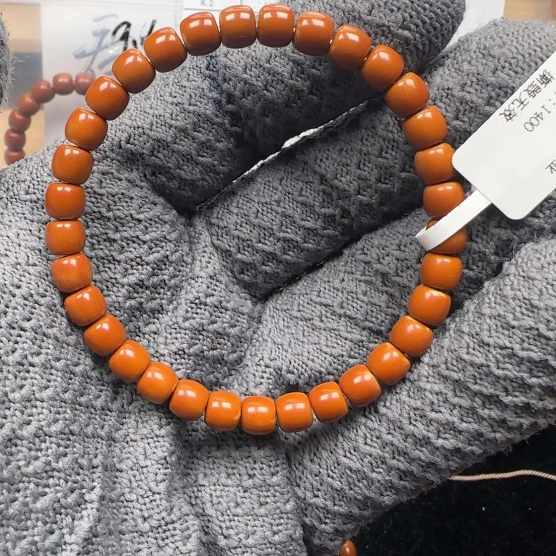 橄榄核手串老挝6.7mm三花单圈