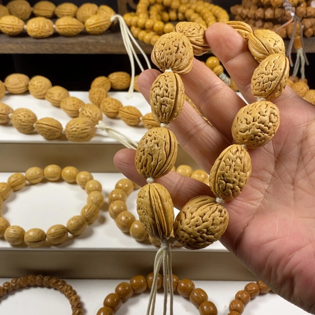 壹***桃核吊坠沈阳钱袋子原皮手持