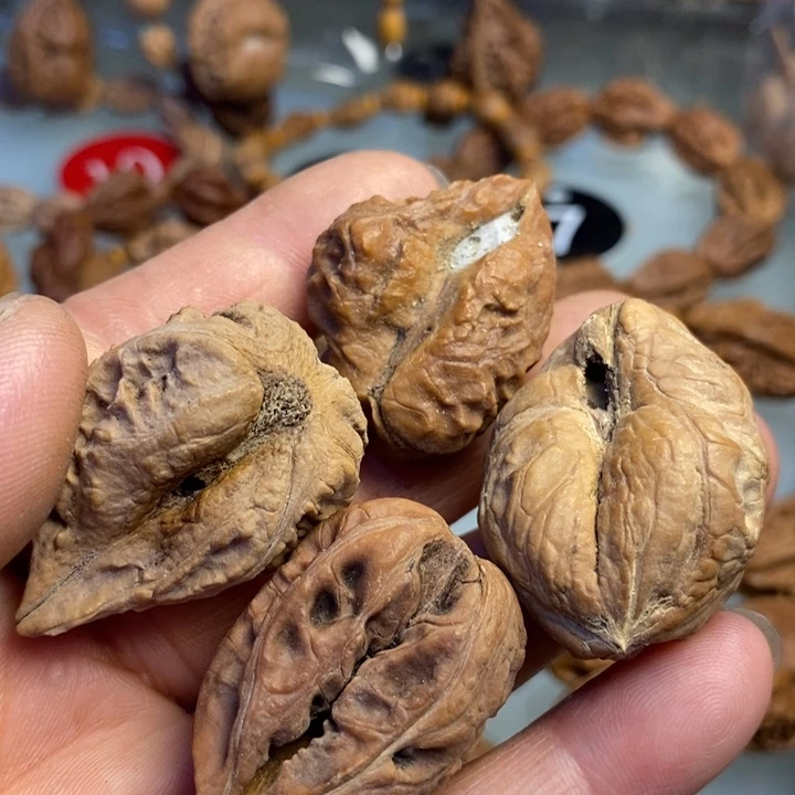 枸***雕橄榄核把件拿姐工艺23