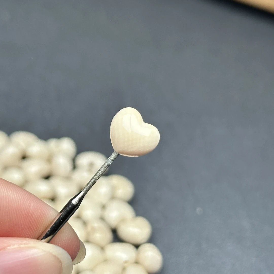 A257天然猛犸牙小爱心约10×9×7.5mm支持鉴定 假一罚四