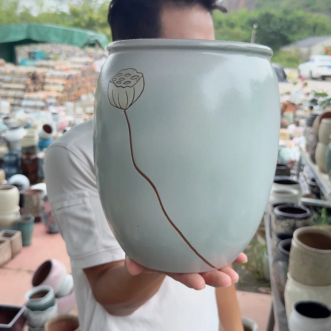 紫砂花盆口19高25（一个莲子刻绘天青