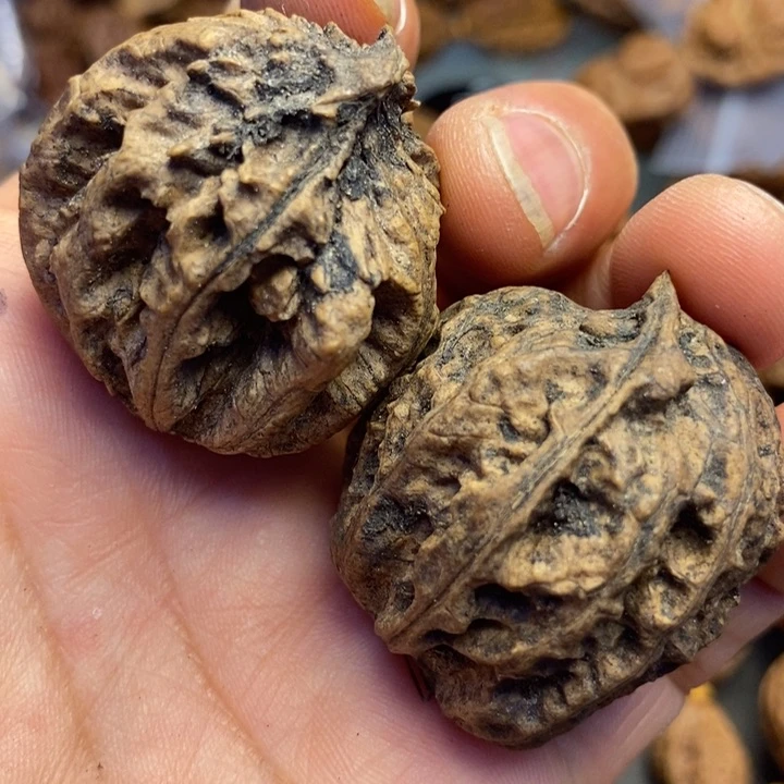 橄榄核把件拿姐工艺78
