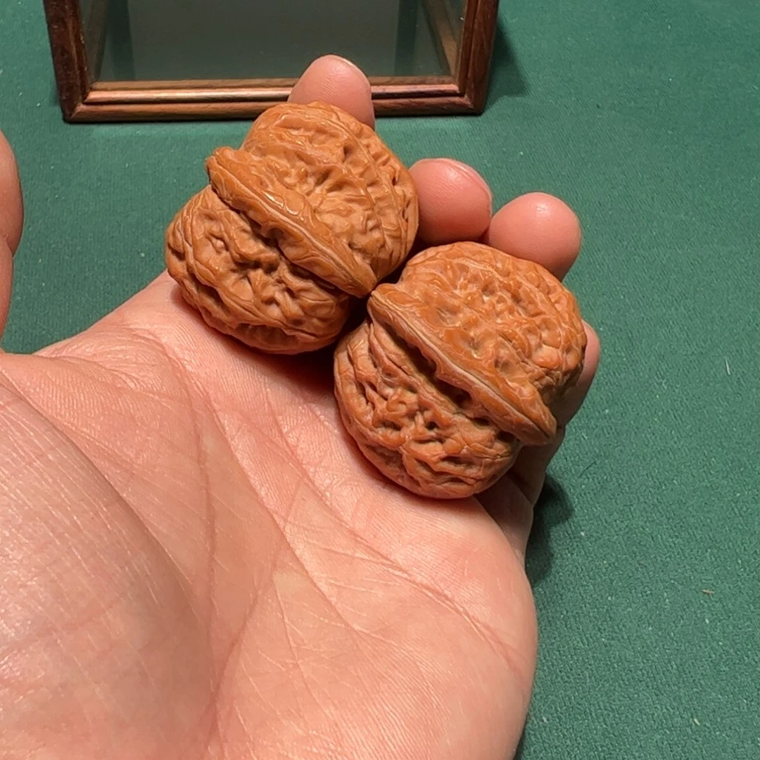 杨***超文玩核桃把件元宝 40肚