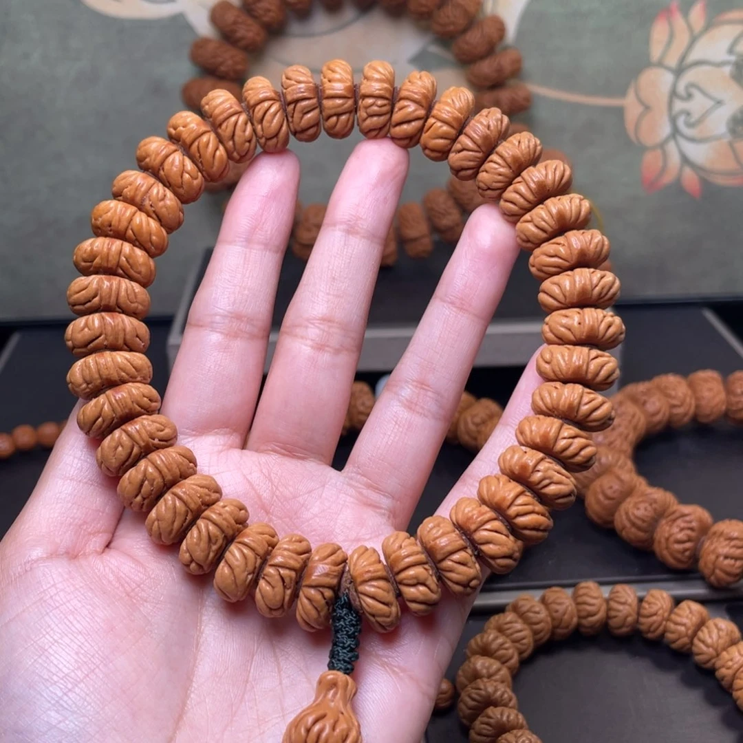 我***曲桃核吊坠16祥云纽扣手持