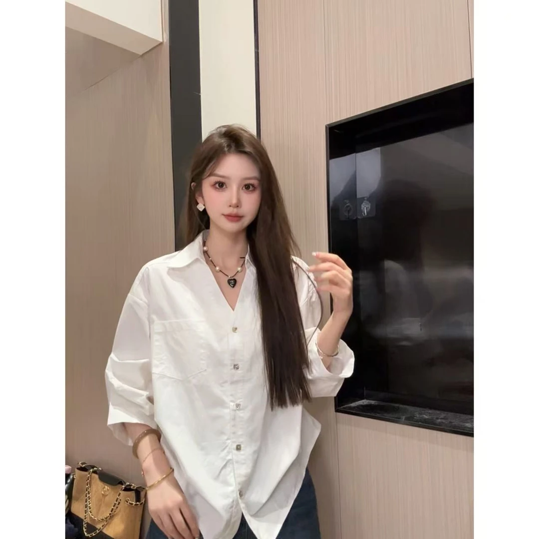 韩系慵懒风宽松百搭显瘦设计感V领衬衫女春秋新款灯笼袖口袋上衣