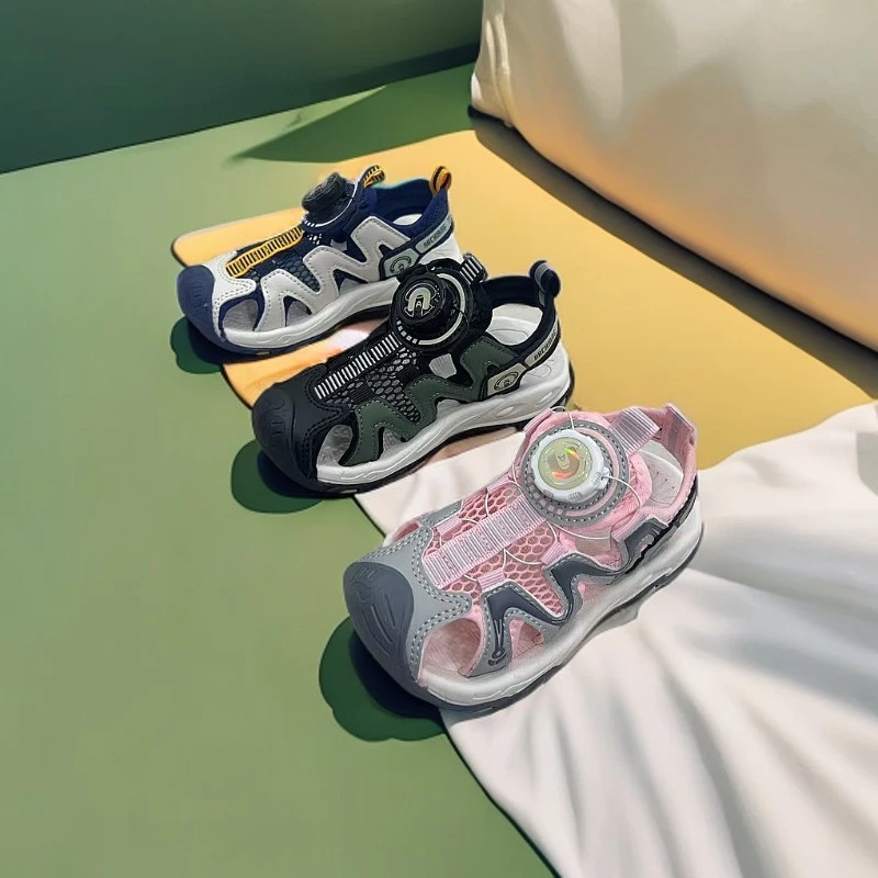 夏季新款男女童旋转纽扣包头凉鞋时尚休闲儿童沙滩凉鞋666