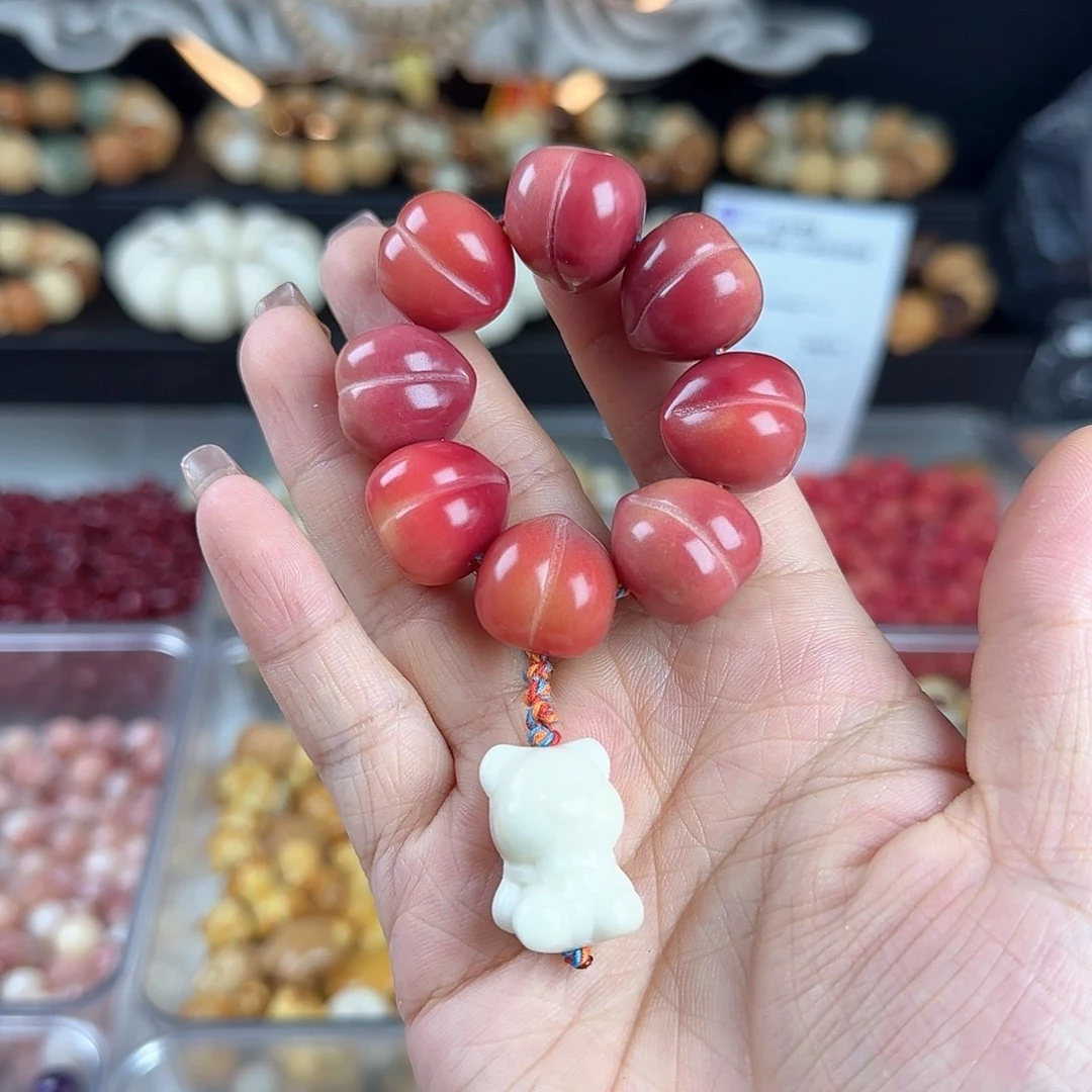 菩提根/象牙果吊坠哎***?瑕疵桃子手捻1个