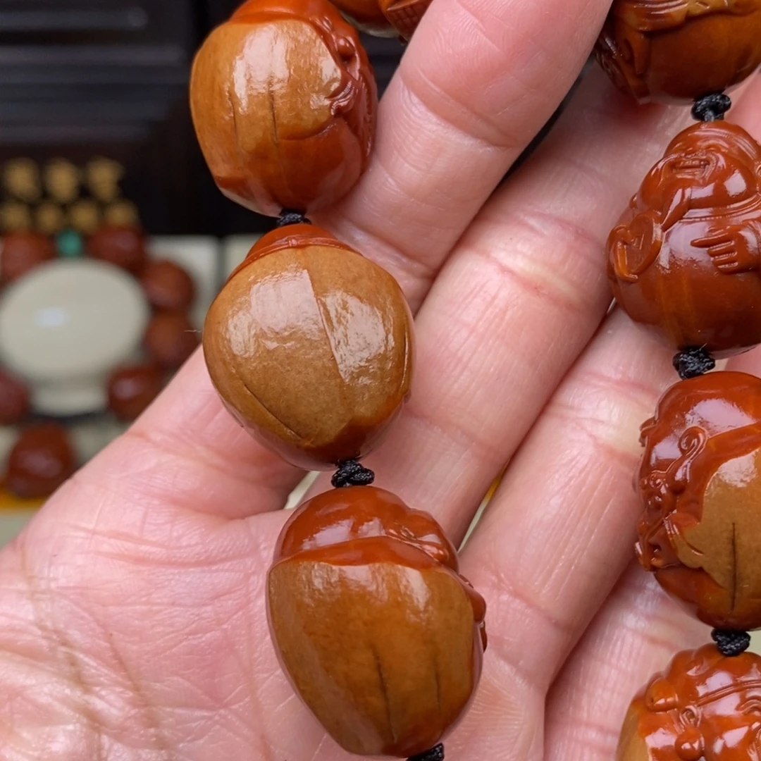 山****橄榄核吊坠财迷财迷