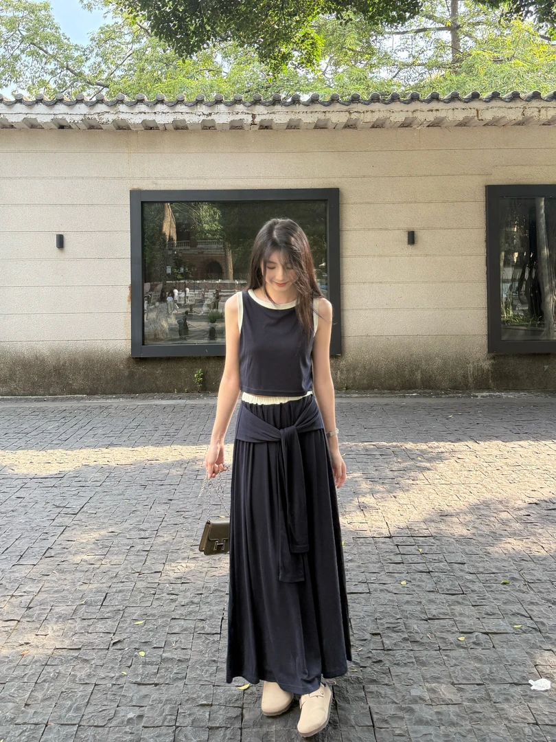 时尚气质套装女2025夏季新款无袖背心上衣+显瘦半身裙长裙两件套