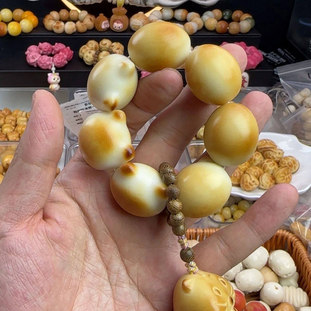 菩提根/象牙果吊坠微瑕疵卡27炭烤猫头手1个
