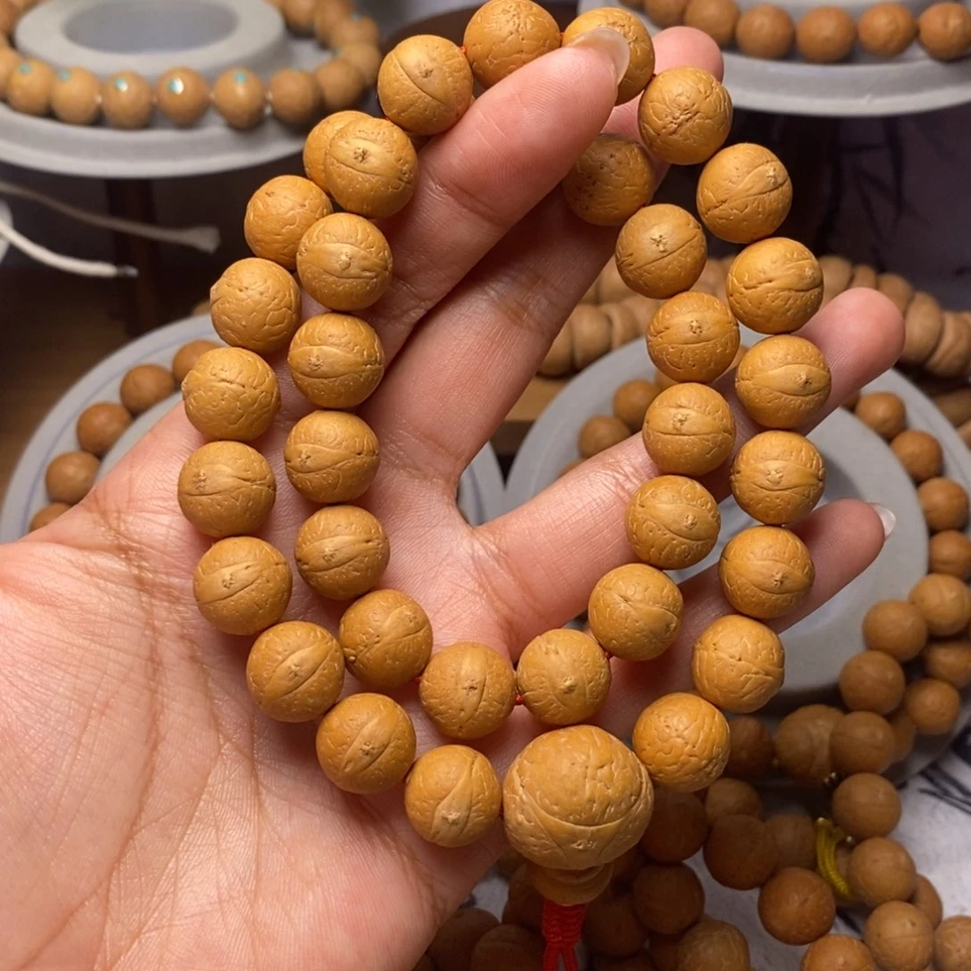 凤眼菩提吊坠手持