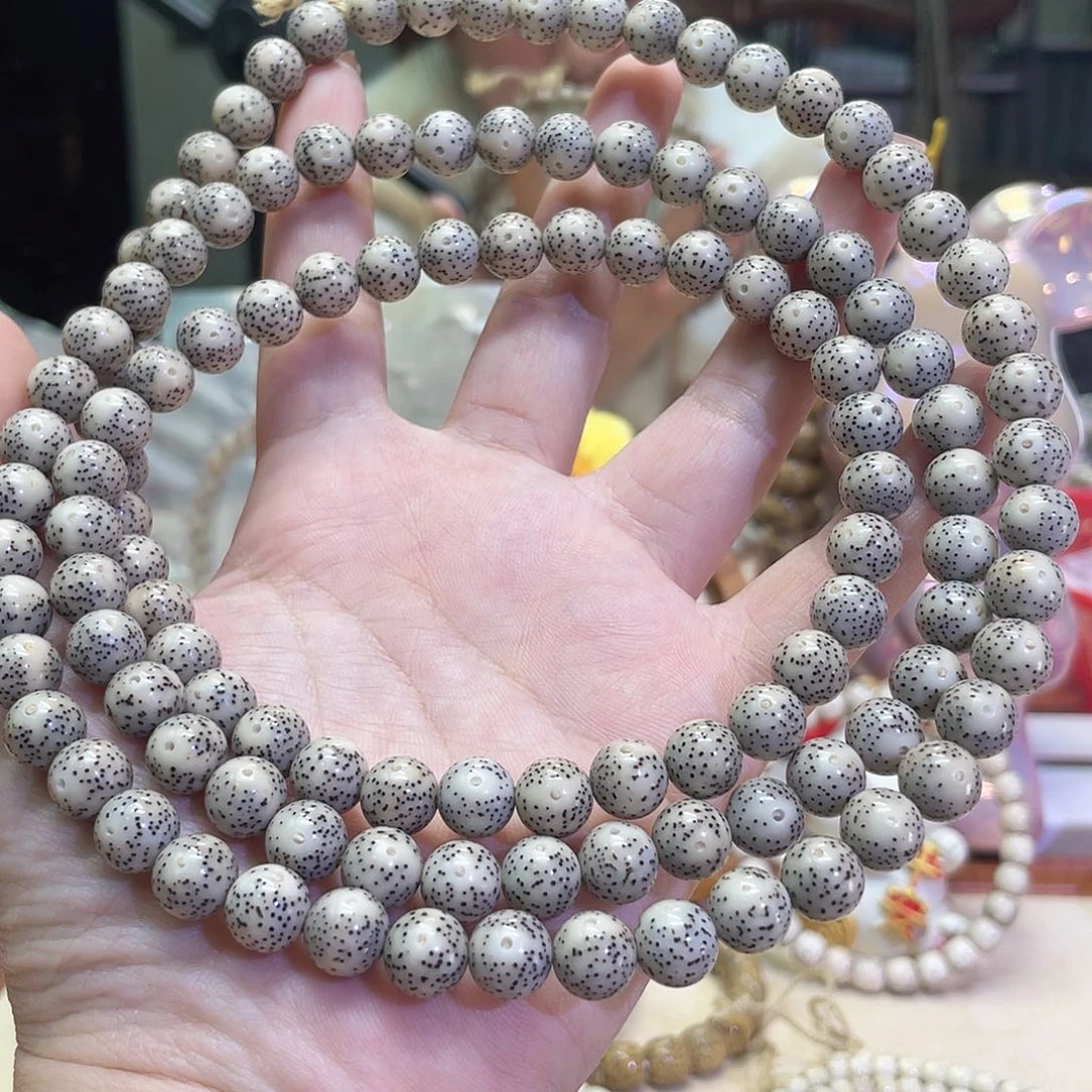 吊坠星月菩提赵**?星月菩提海南同枝果9x9