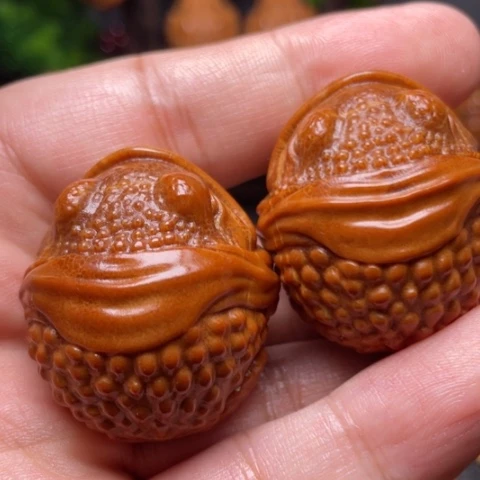 橄榄核把件大嘴哇手球一对3.5左右