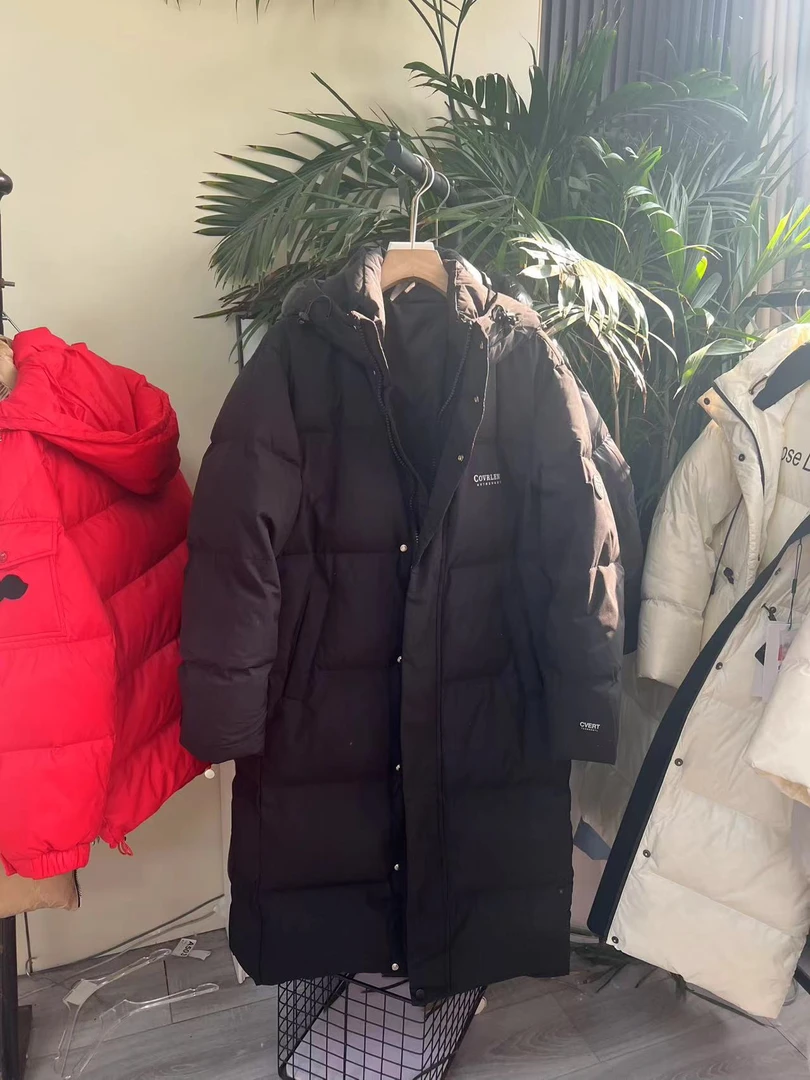 高档时尚情侣羽绒服女中长款2024年新款黑色连帽加厚保暖百搭外套