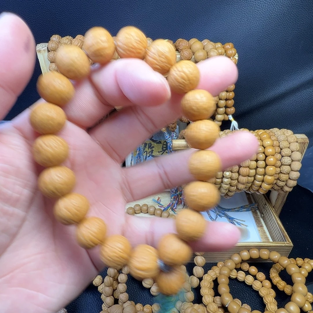 十***人手串猴头核桃极致打底凤羽手持