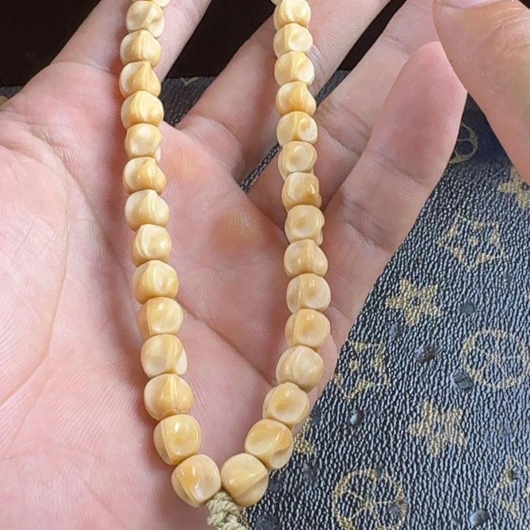 龙眼菩提吊坠手串