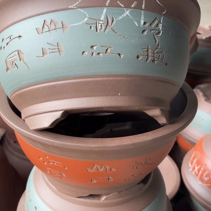 紫砂花盆100-3。  37-17。