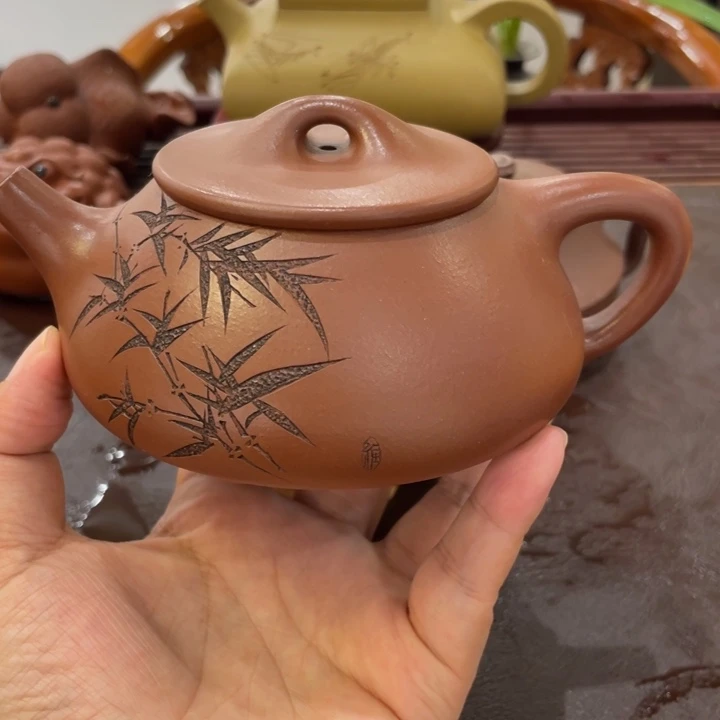挥***人茶壶紫砂底槽清满瓢手工刻绘