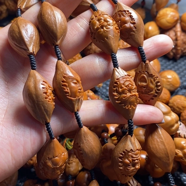 吊坠橄榄核一**安包衣罗汉