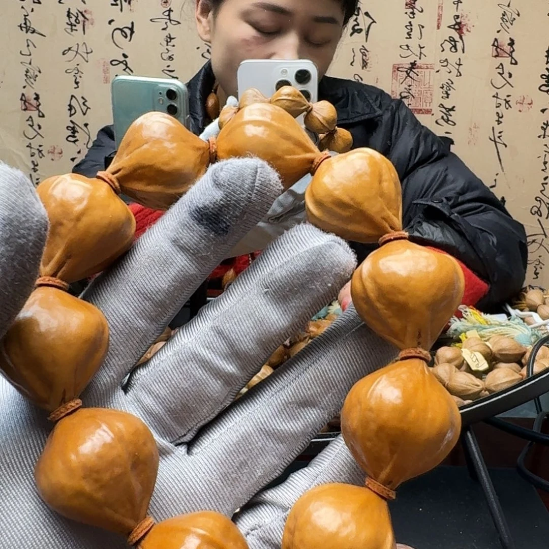 紫***酱手串橄榄核水晶核