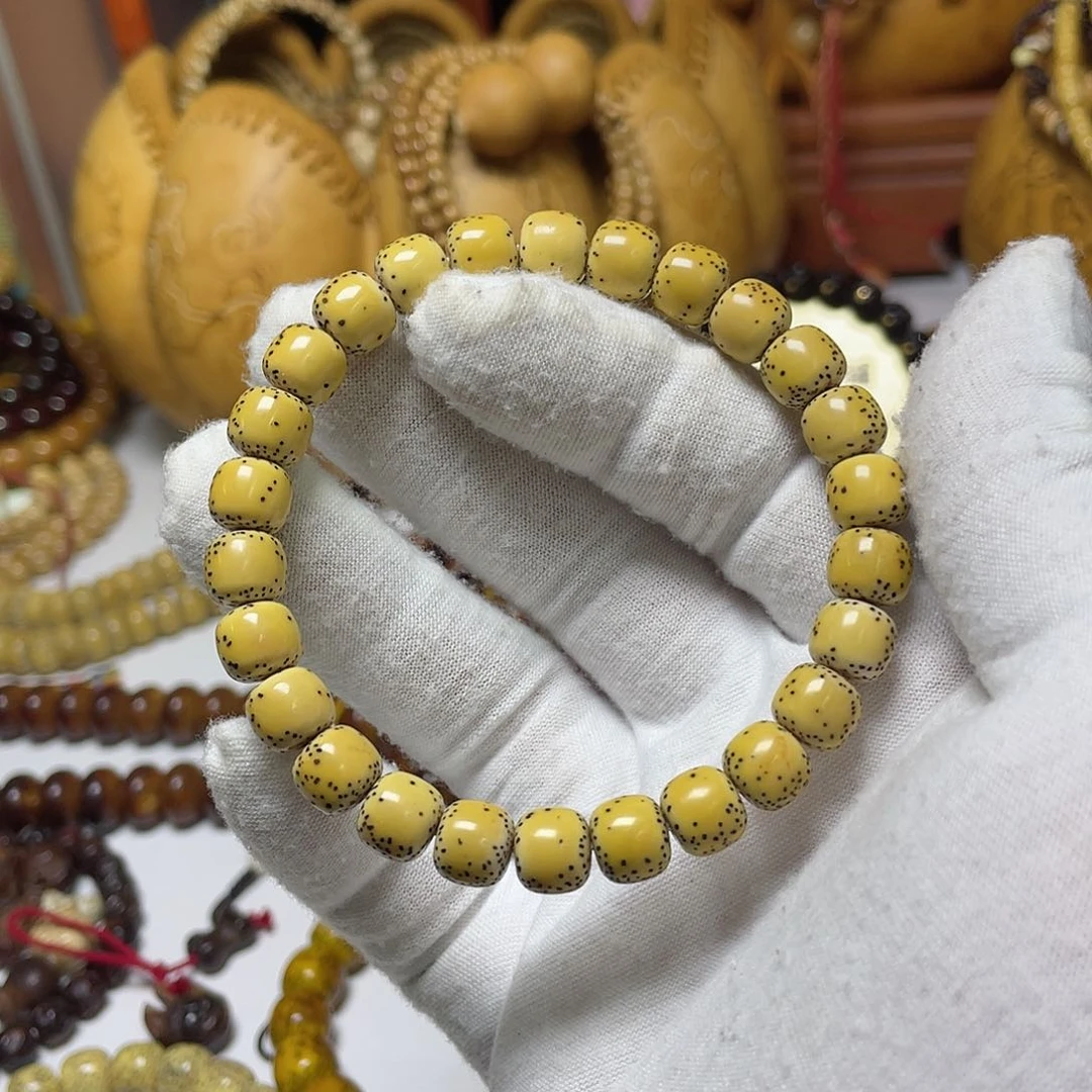 手串星月菩提8-9老型桶侧留白鸡油黄