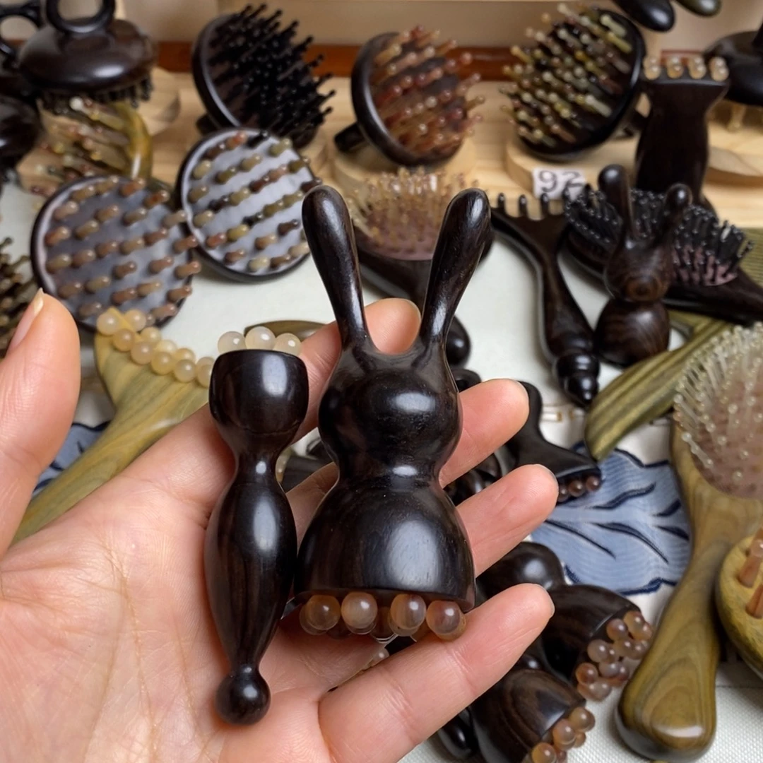 紫光檀兔子1个眼刮1个