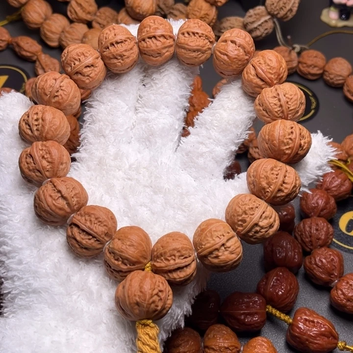 庄***人文玩核桃手串磨盘