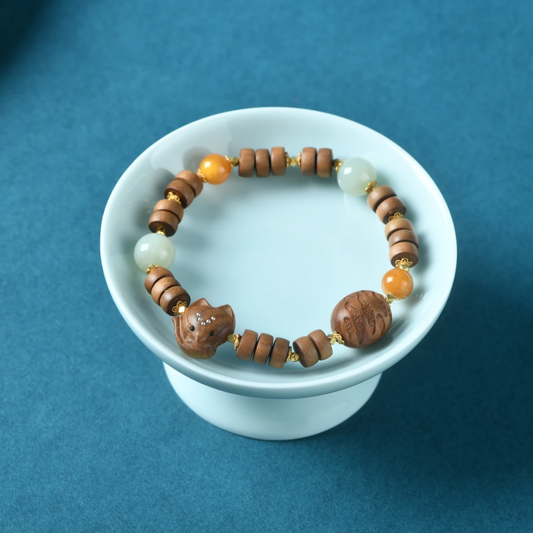 印度老山檀香片片珠凤九手链