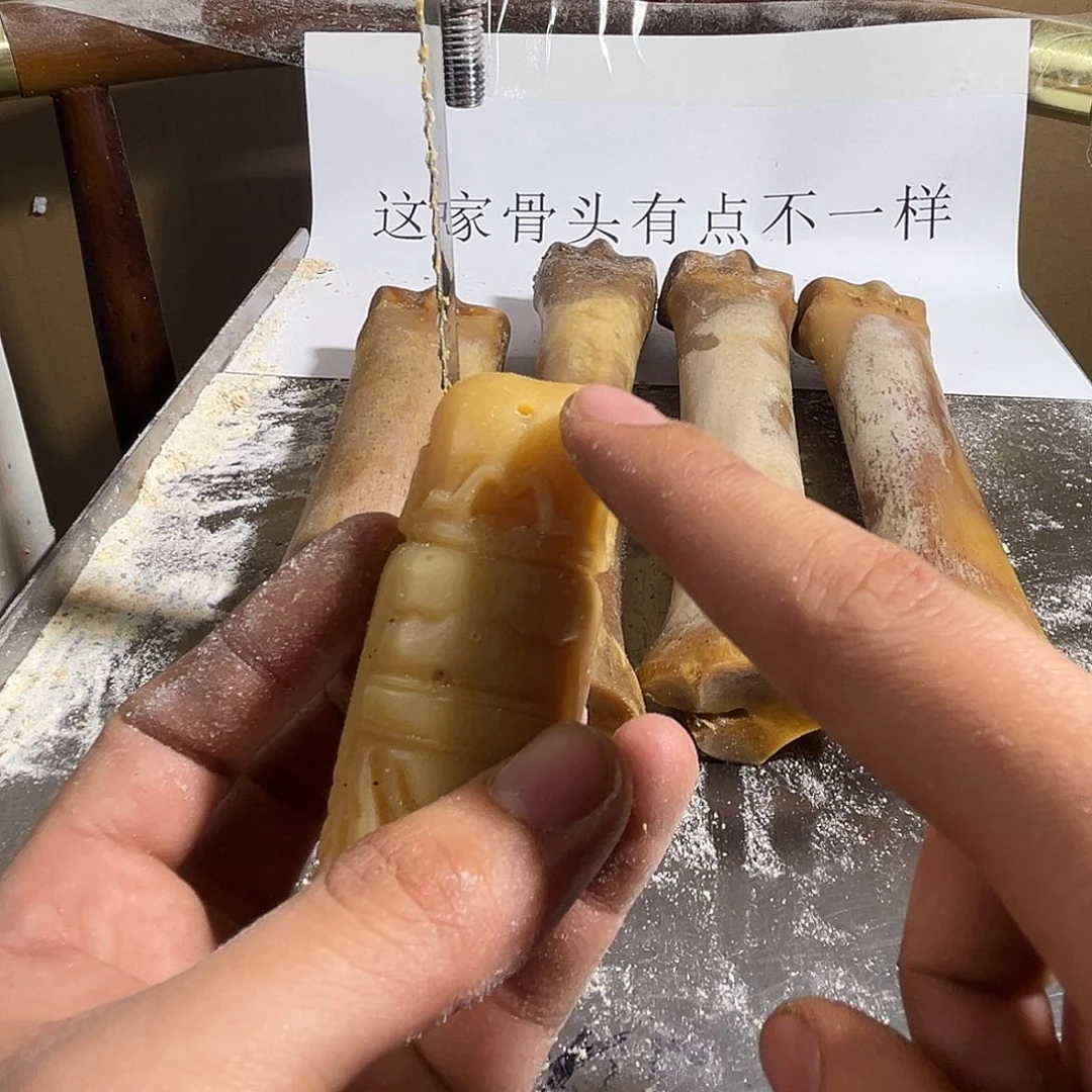 瓷yy驼骨雕刻财神手吧